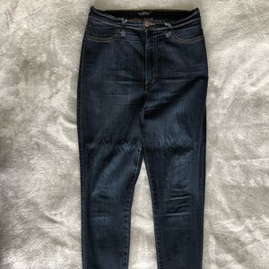 Dark wash jean leggings.